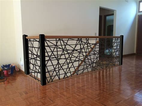 compsnies that make metal railing and enclosures|custom made metal stair railings.